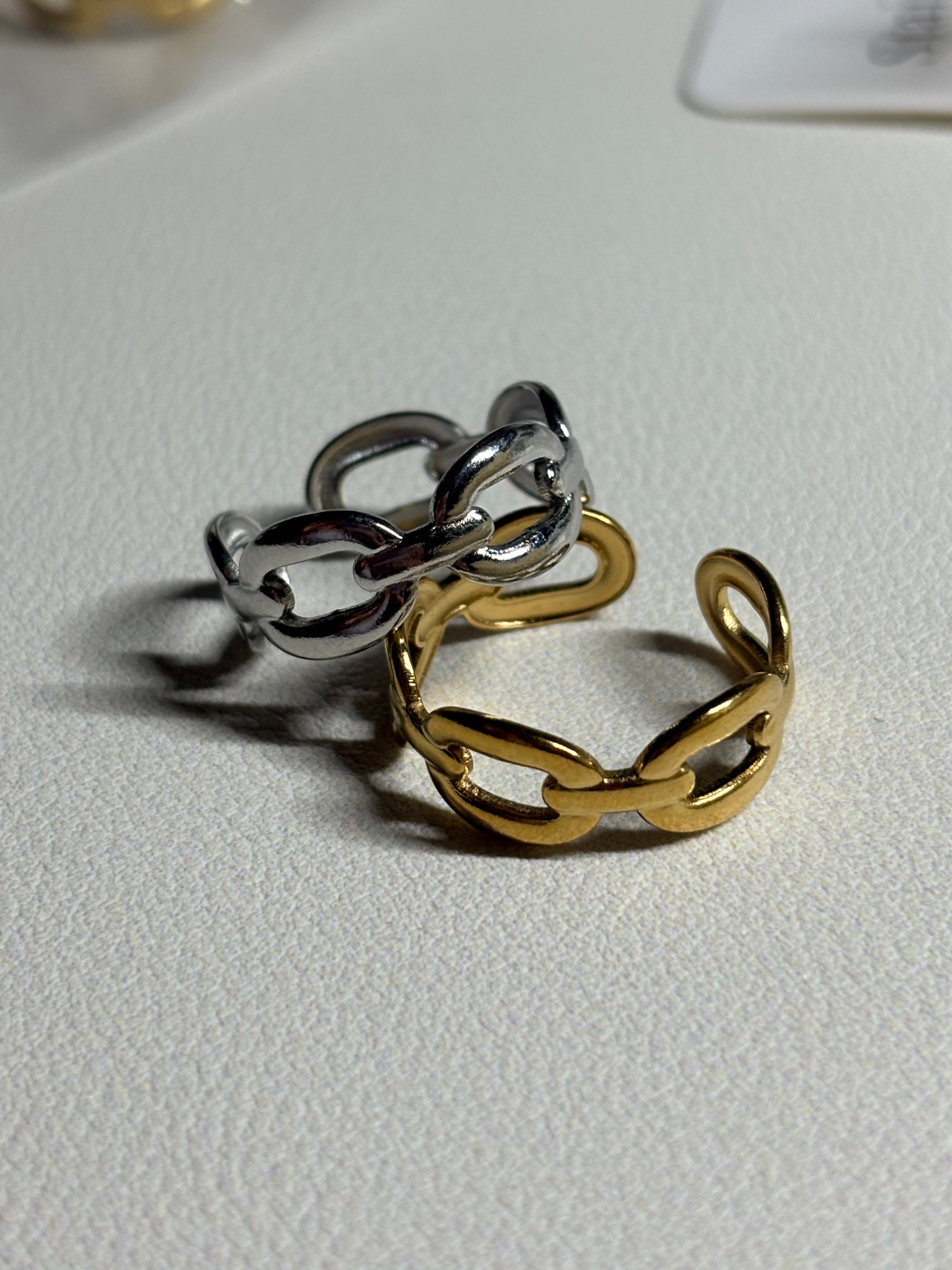 Gold and silver chain-style rings